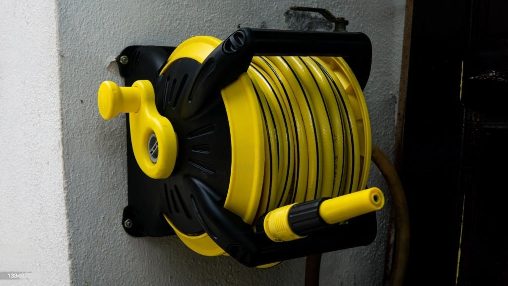 When I wind extension cords back onto the storage reel, I wrap it